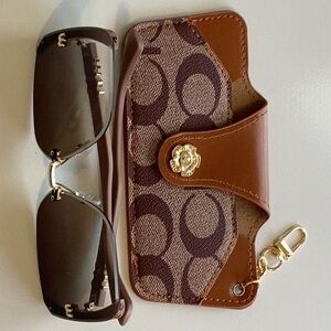 Elegant Designer Sunglasses with Signature Pattern Case
